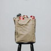 A canvas bag of canned goods.